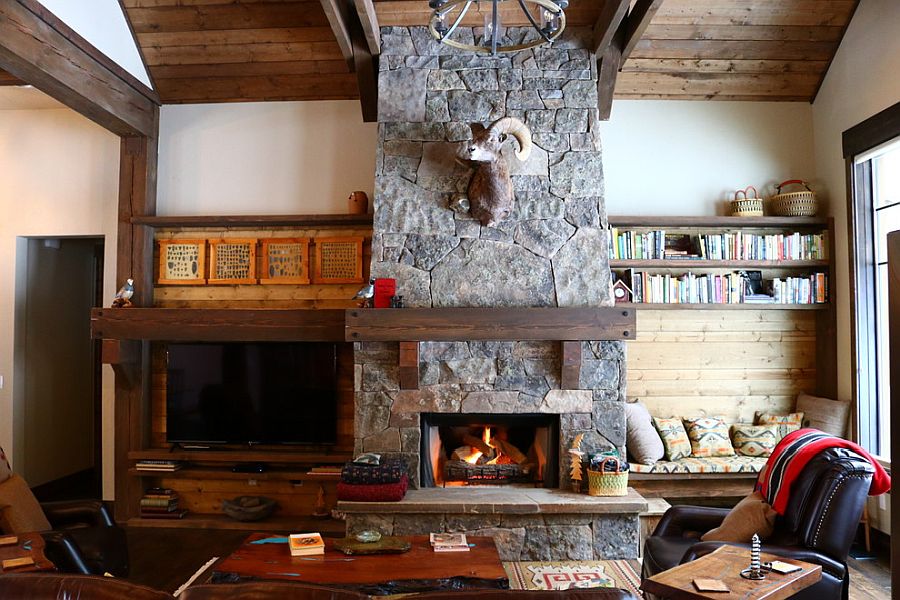 Lovely-stone-fireplace-is-a-staple-in-the-rustic-living-room-that-never-fails-to-impress