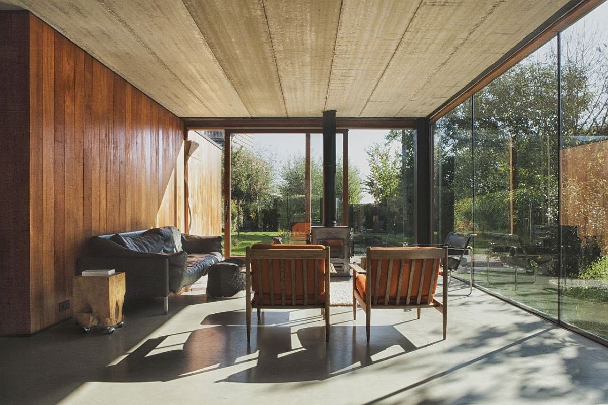 Lower level living area of the House GePo with a view of the small lake