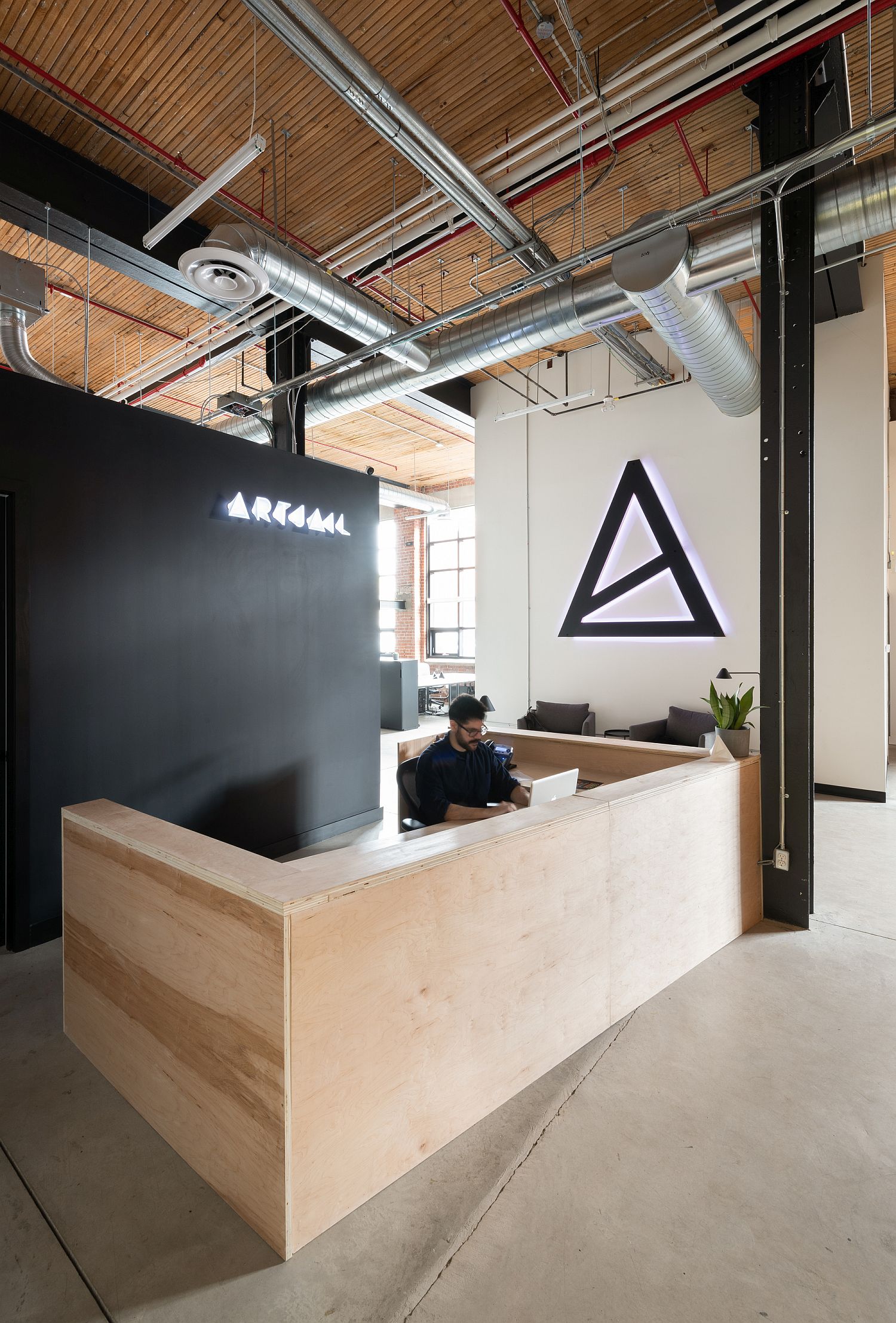 Metal, wood and dark black entrance to the studio