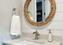Mirror-with-rope-frame-accentuates-the-coastal-appeal-in-this-white-powder-room-217x155