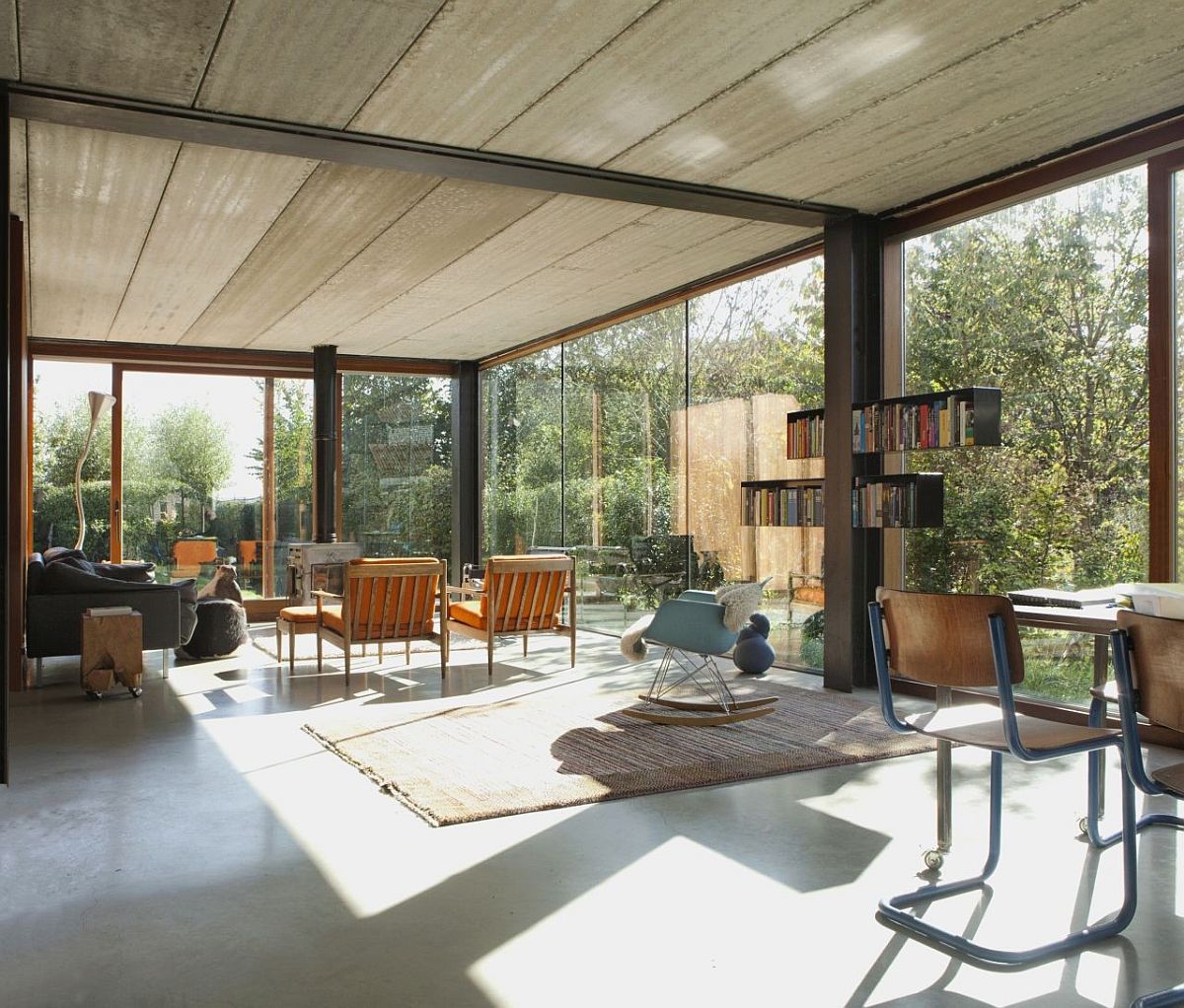 Open ambiance of the living room surrounded by greenery