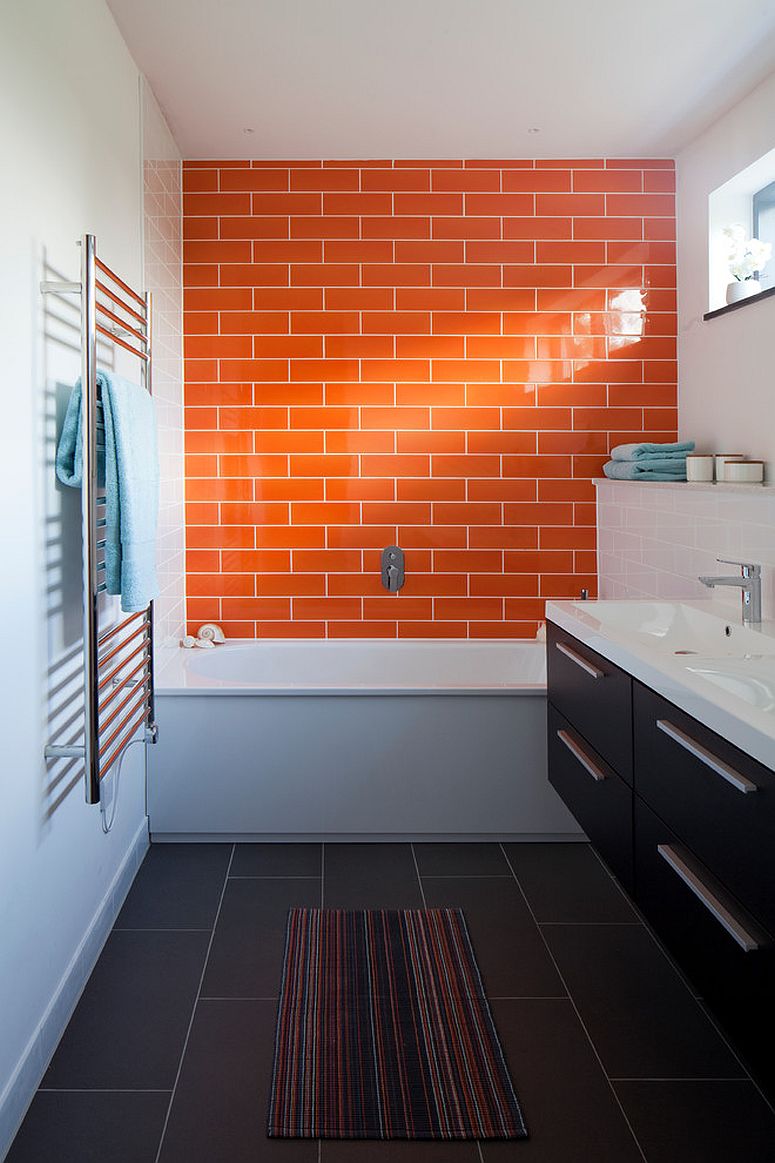 Orange-tiled-accent-wall-for-the-narrow-modern-bathroom