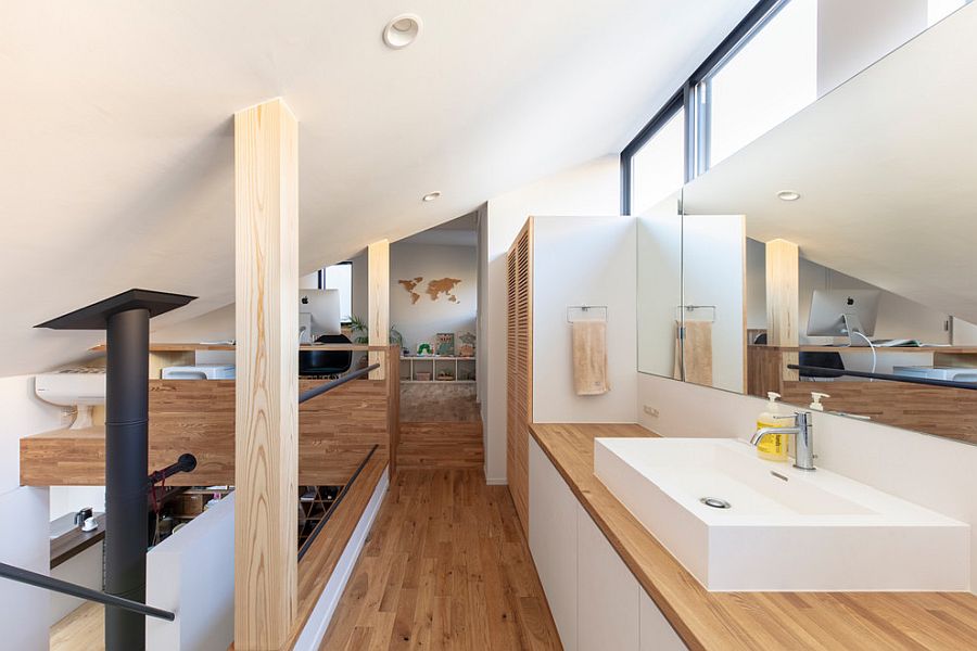 Powder room feels like an extension of the bedroom in the attic