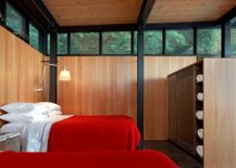 Relaxing-and-minimal-bedroom-of-the-Boat-house-with-bedding-in-red-217x155