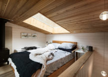 Skylight-above-the-bedroom-bed-offers-a-window-into-the-sky-217x155