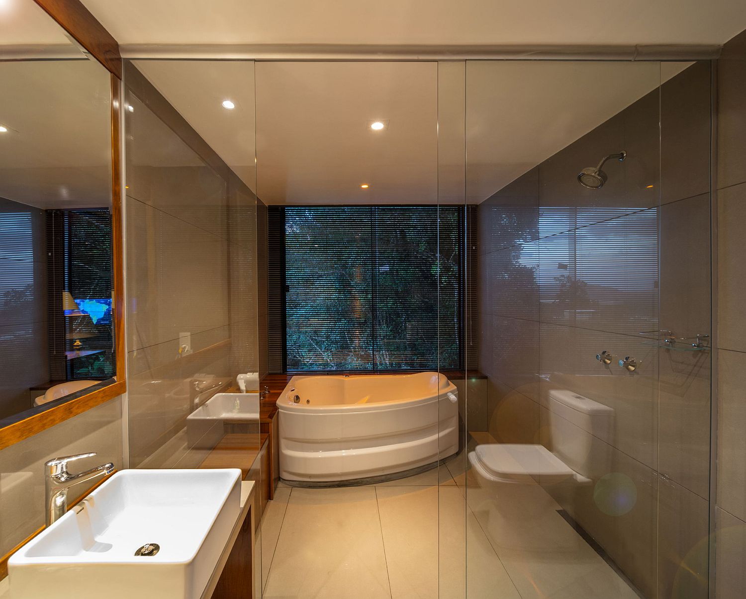 Small bathroom of the cabin with bathtub and shower area