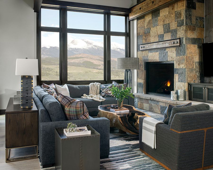 Stunning-rustic-living-room-with-stone-fireplace-and-a-view-to-match