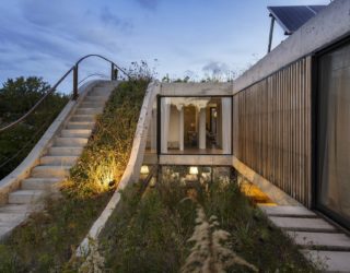 Modern Concrete Home with a Fabulous Garden Spread Across Three Different Levels