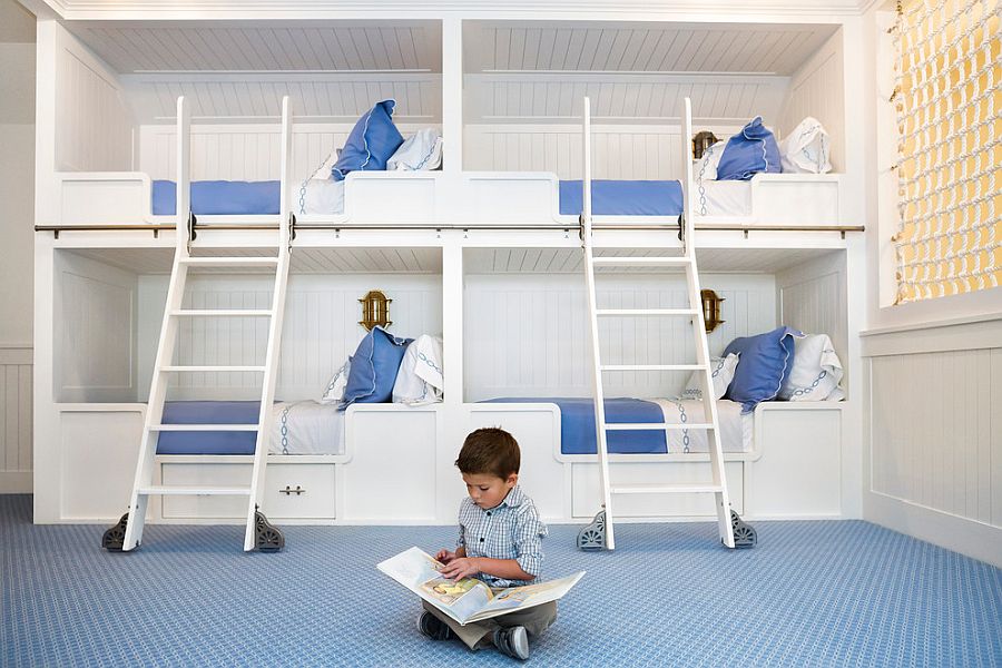 Wall-of-bunk-beds-for-the-space-savvy-beach-style-kids-bedroom-in-white-and-blue