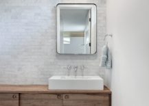 White-modern-bathroom-with-contemporary-style-and-a-floating-wood-vanity-217x155