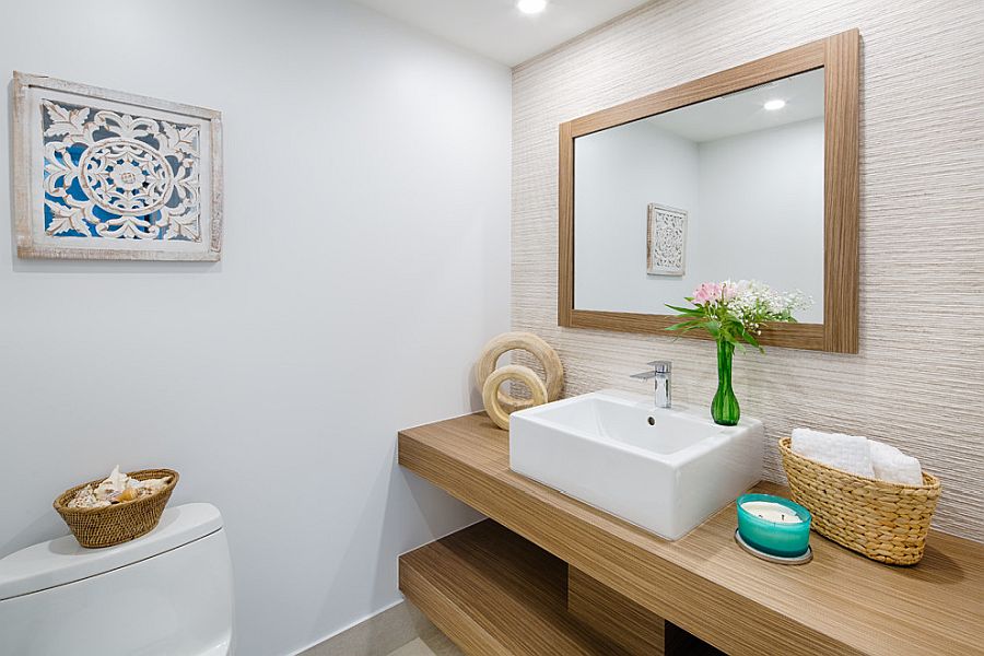 Wood and white powder room of the modern Miami home with coastal flavor