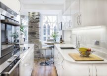 Accent-stone-wall-and-space-savvy-design-ensure-that-this-kitchen-stands-out-from-the-crowd-217x155