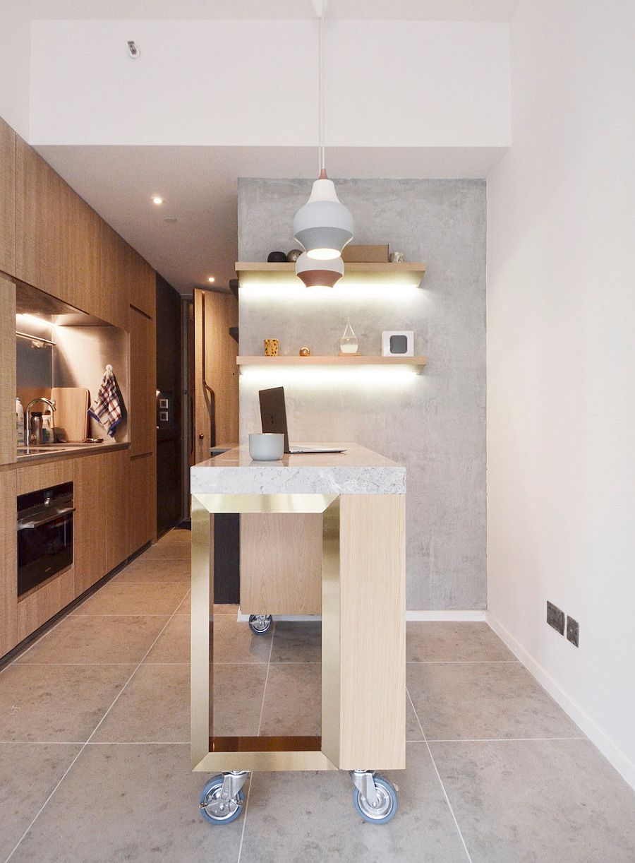 Beautiful pendants blend into the gray backdrop of the kitchen