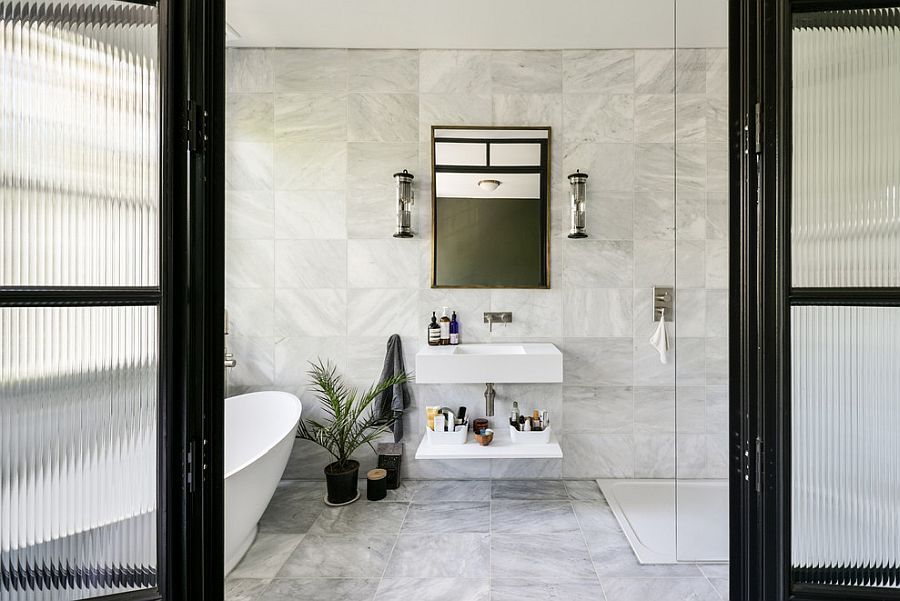 Black-frame-for-the-sliding-glass-doors-of-the-white-bathroom