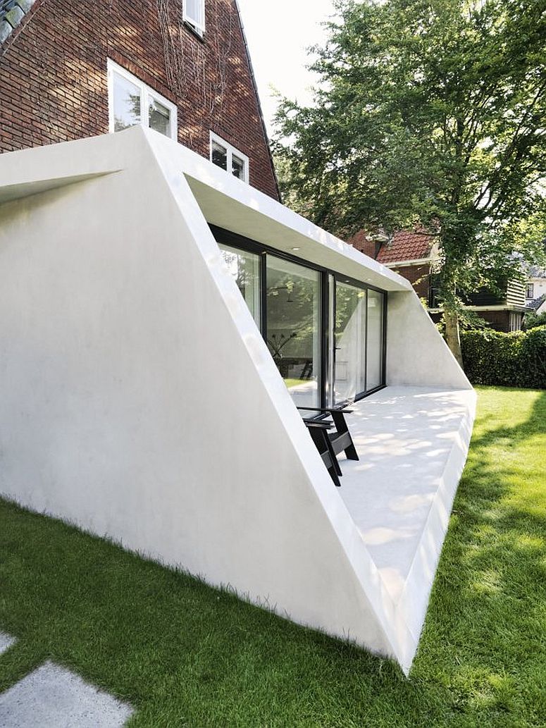 Contemporary lower level living space of the revamped 1930s house