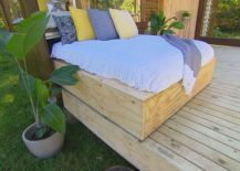 Daybed-rolls-out-on-to-the-deck-to-provide-a-lovely-outdoor-relaxation-zone-217x155