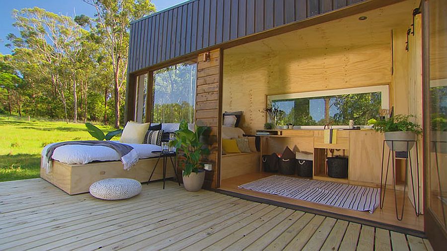 Fabulous tiny house with a daybed that opens up onto the deck when needed