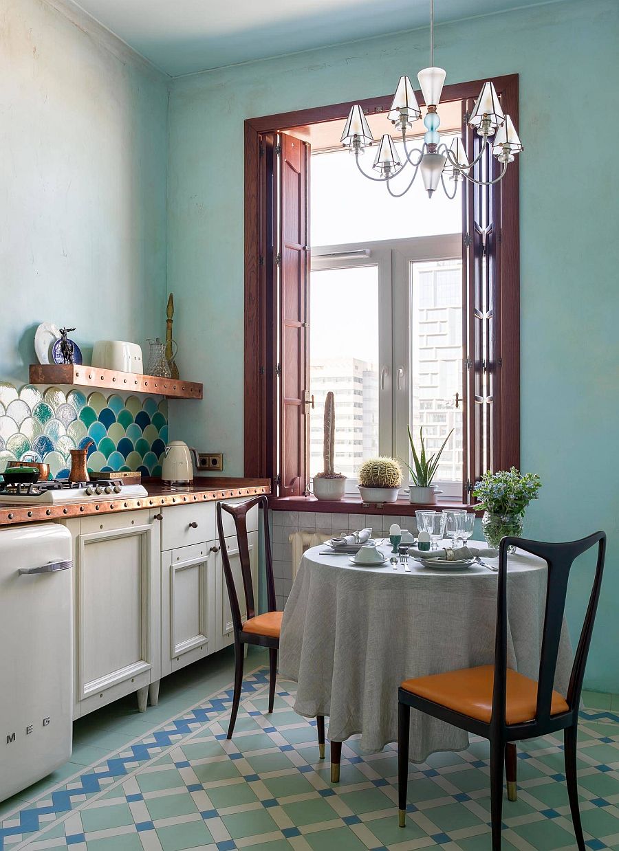 Large window brings all the necessary light into this Mediterranean style kitchen