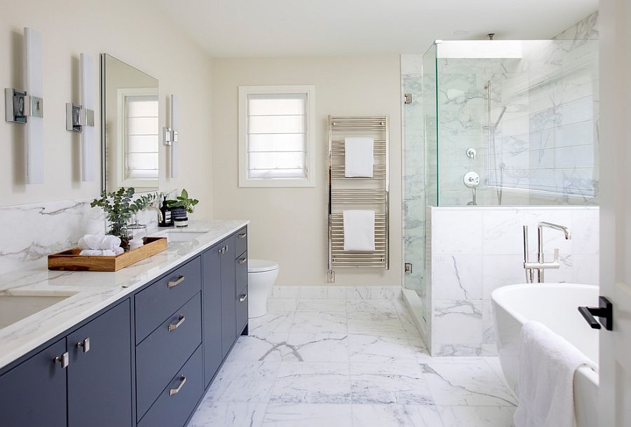 Luxurious bathroom in white with vanity in dark bluish-gray