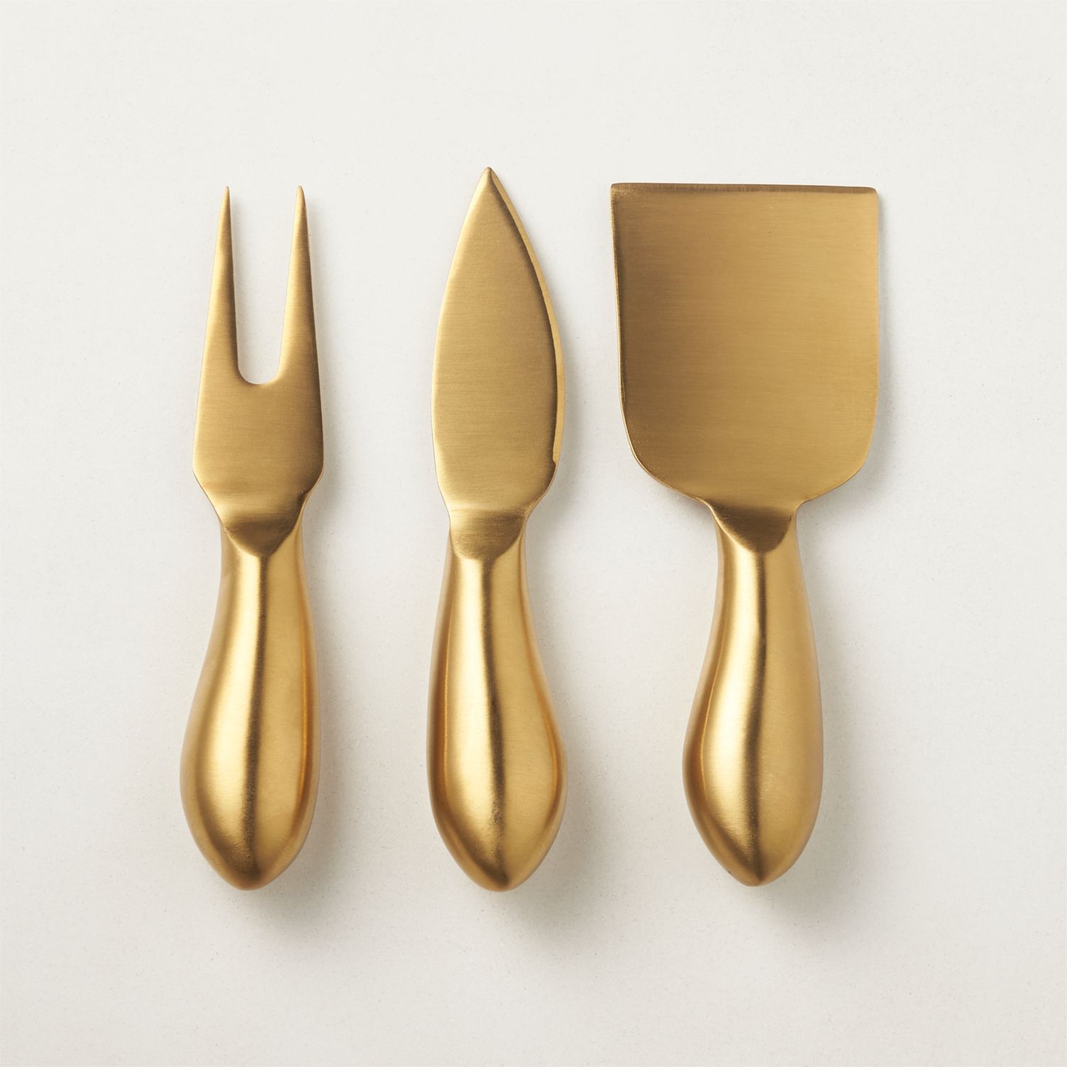 Set of 3 gold cheese knives