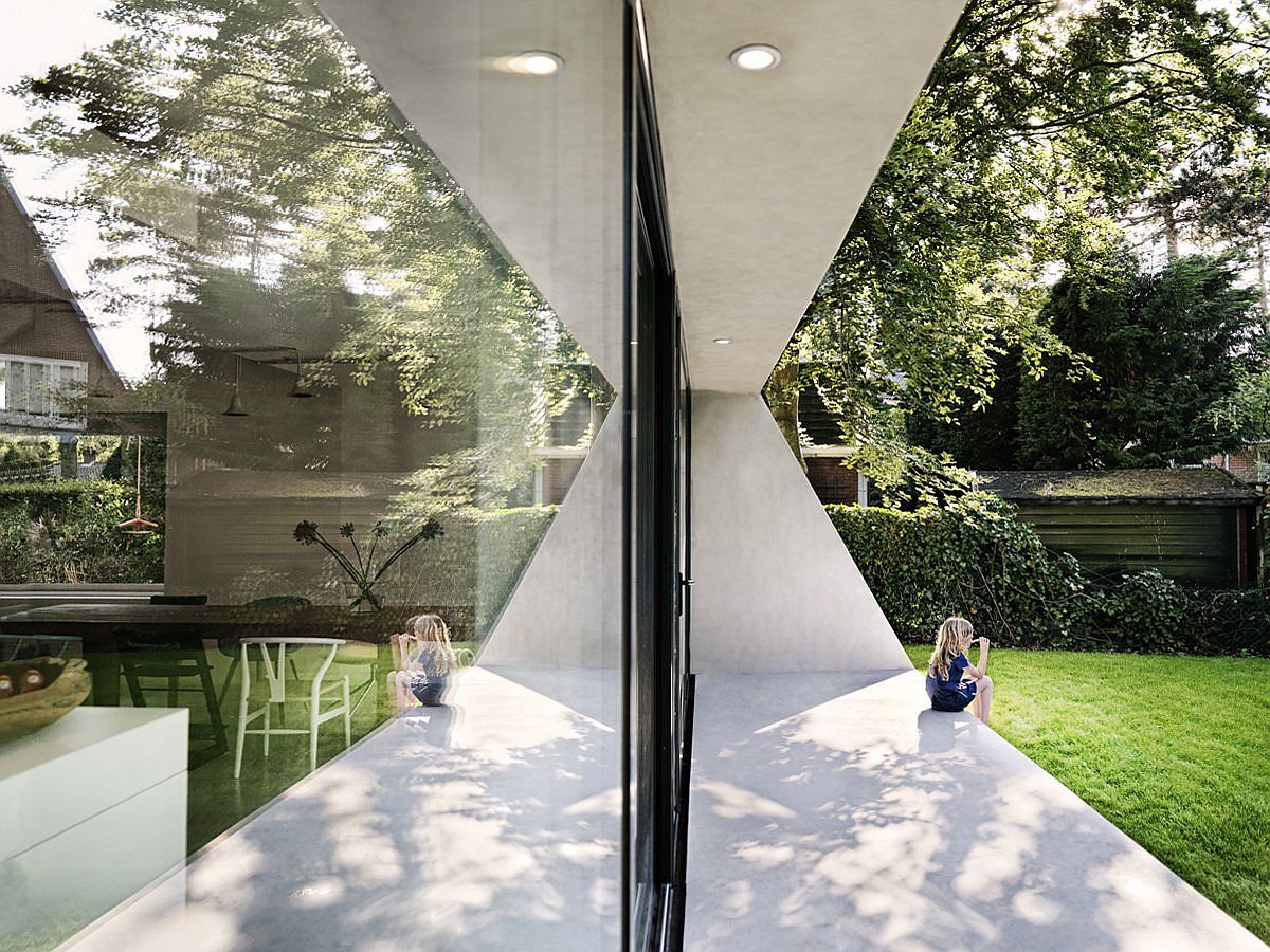 Structure of the house offers a natural patio that overlooks the garden