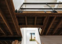 Wooden-upper-level-of-the-house-with-bedrooms-217x155