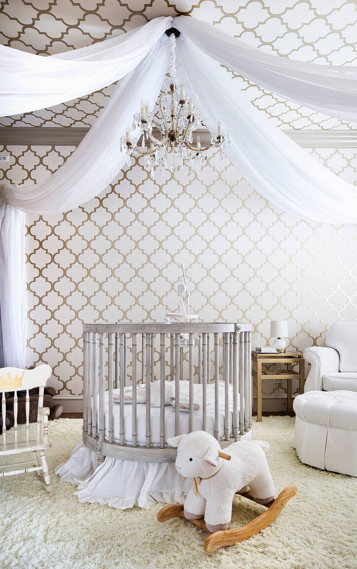 Amazing Mediterranean style nursery with wallpaper, eye-catching lighting and white sheers