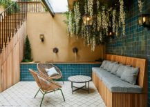 Basement-courtyard-with-innovative-seating-and-green-glitz-217x155