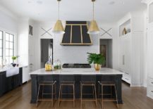 Black-and-brass-used-in-the-white-becah-style-kitchen-as-an-accent-addition-217x155