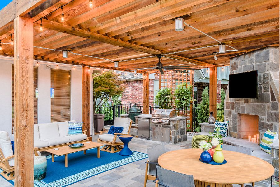 Decor, accents and the rug add delightful blue to the curated patio