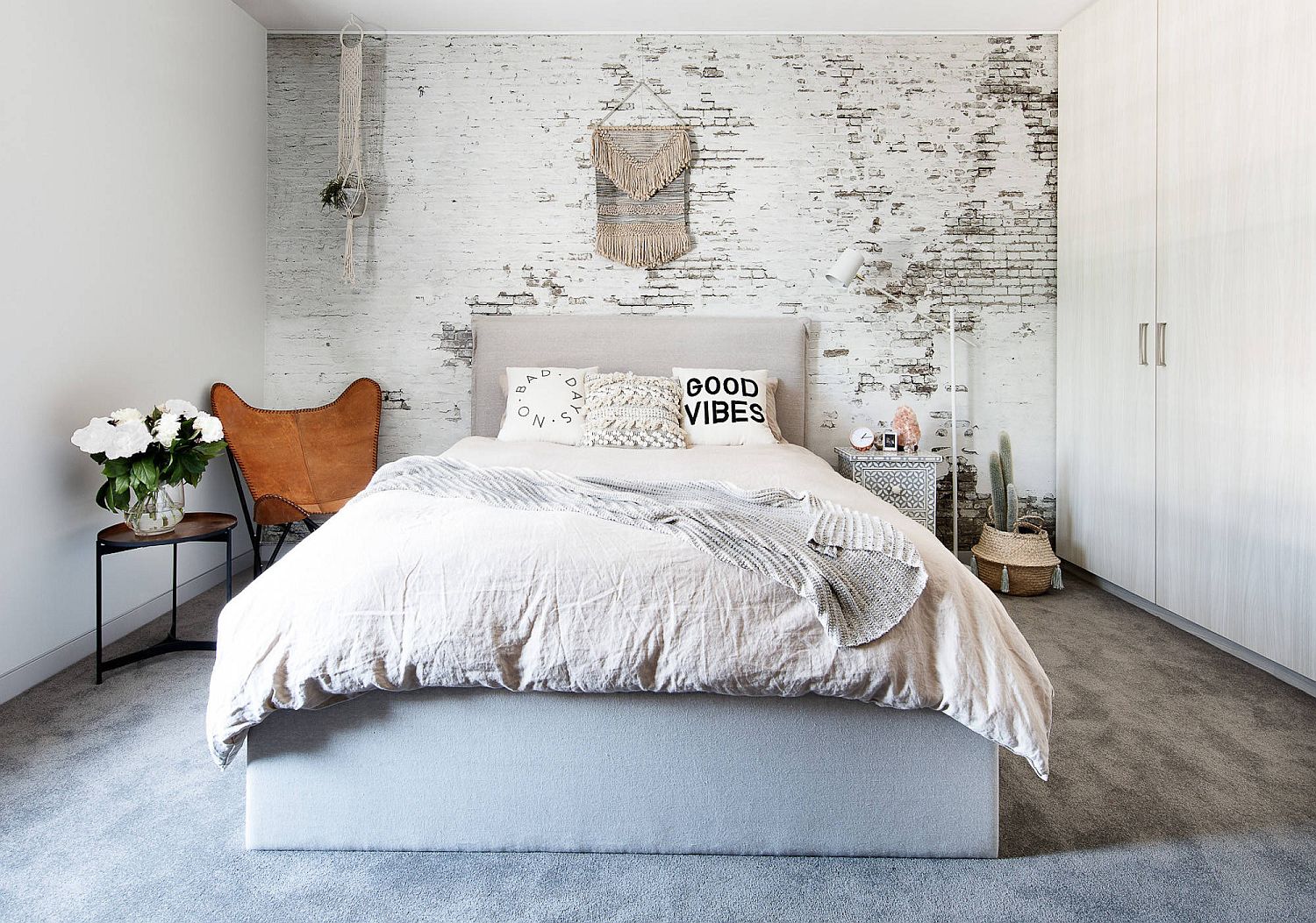 Gorgeous-modern-Scandinavian-style-bedroom-witnh-brick-wallpaper-that-steals-the-spotlight