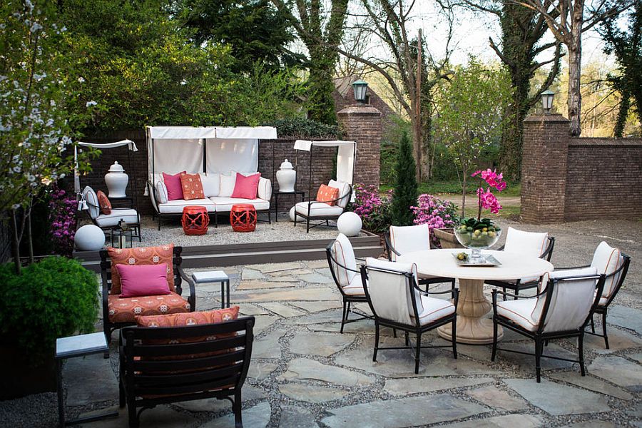 Keeping the outdoor decor neutral accentuates the visual appeal of colorful throw pillows