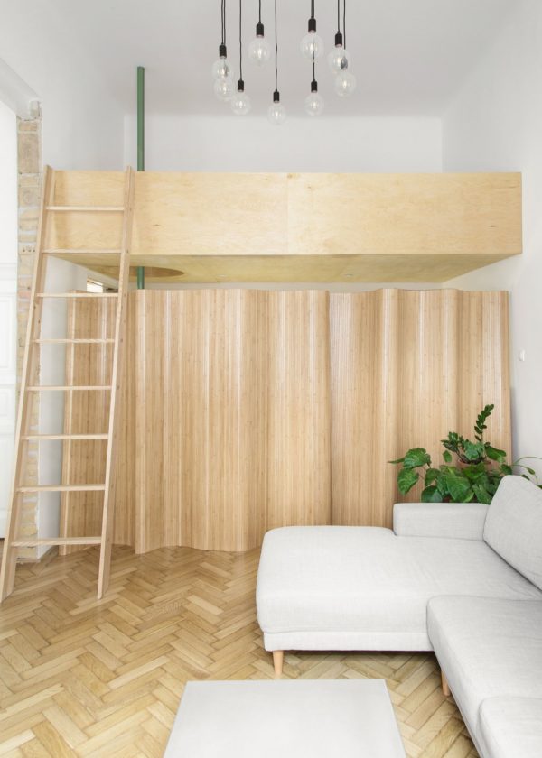 Old Bourgeois Apartment in Budapest Gets a Fresh Makeover in Wood and White