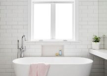 Minimal-and-modern-bathroom-of-the-renovated-Aussie-home-with-freestanding-bathtub-in-white-217x155