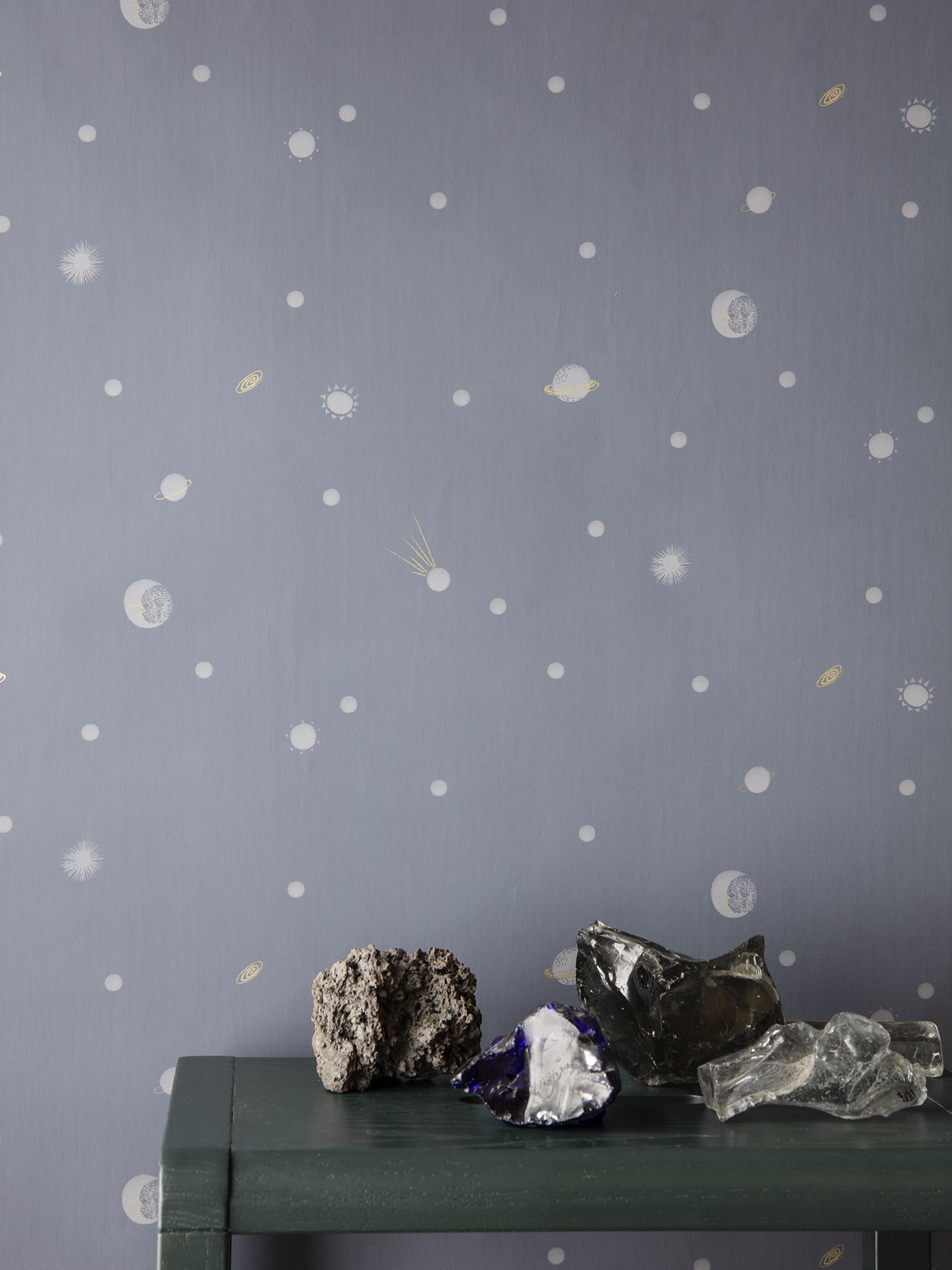 gray wallpaper with celestial pattern