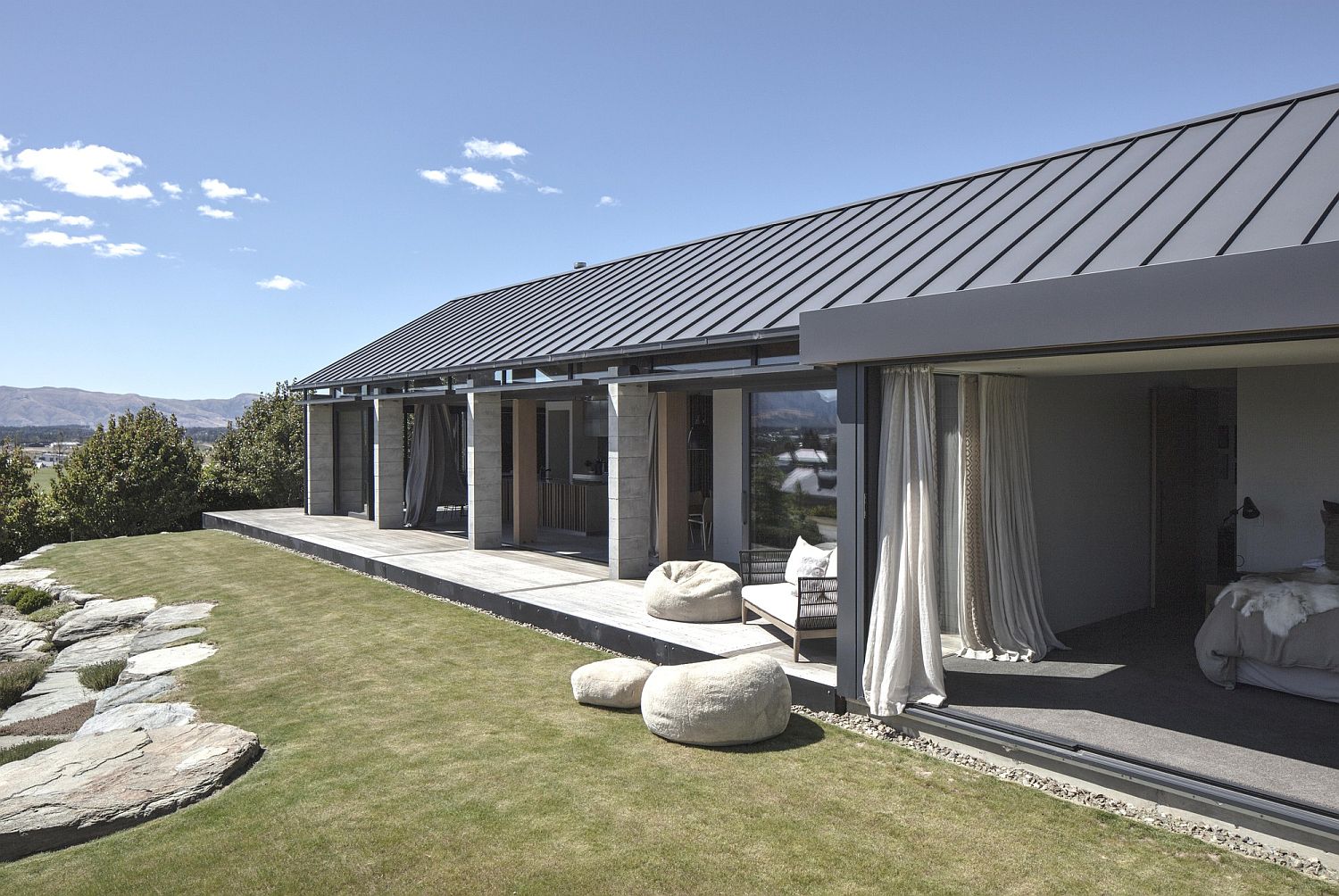 Open design of the house connected to the landscape outside