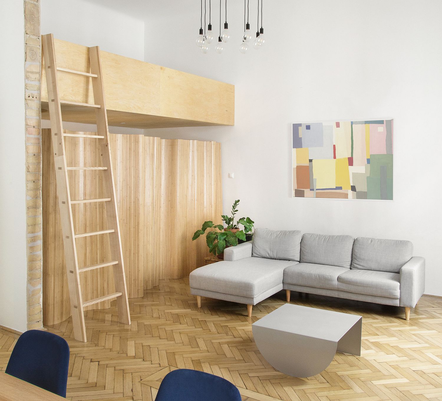Old Bourgeois Apartment in Budapest Gets a Fresh Makeover in Wood and White