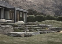 Sustainable-house-in-New-Zealand-with-glass-walls-and-gabled-roof-217x155