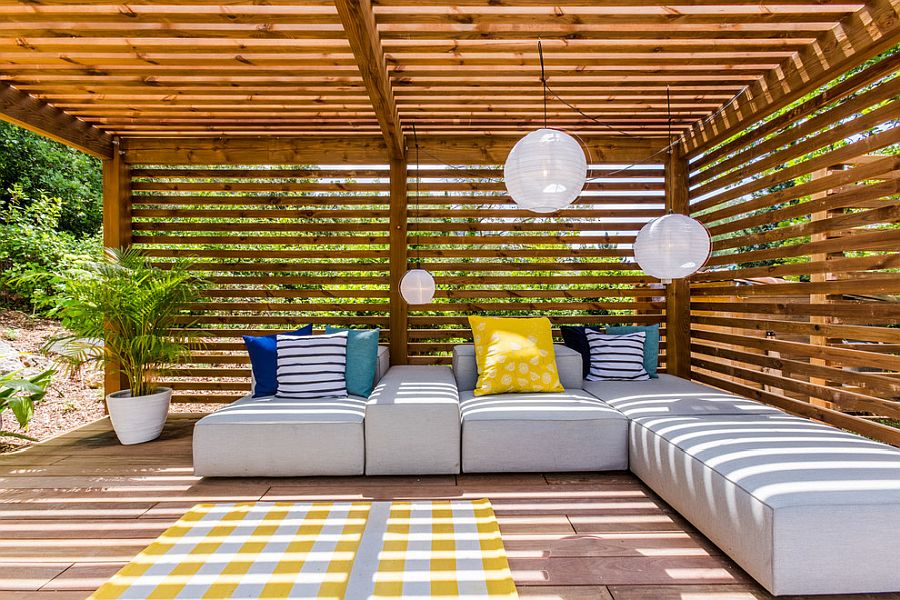 Use throw pillows in multiple colors for a brighter outdoor hangout