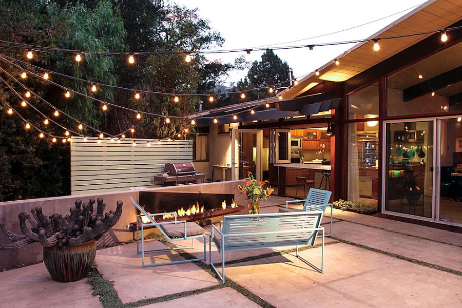 Warm string lighting also gives the outdoor space a festive makeover!