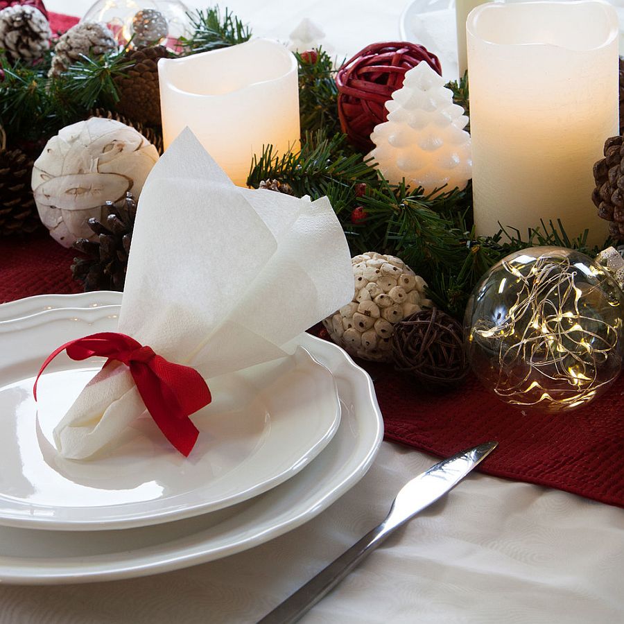 A hint of red can turn the beautiful winter dinner party into one that is more Christmassy!