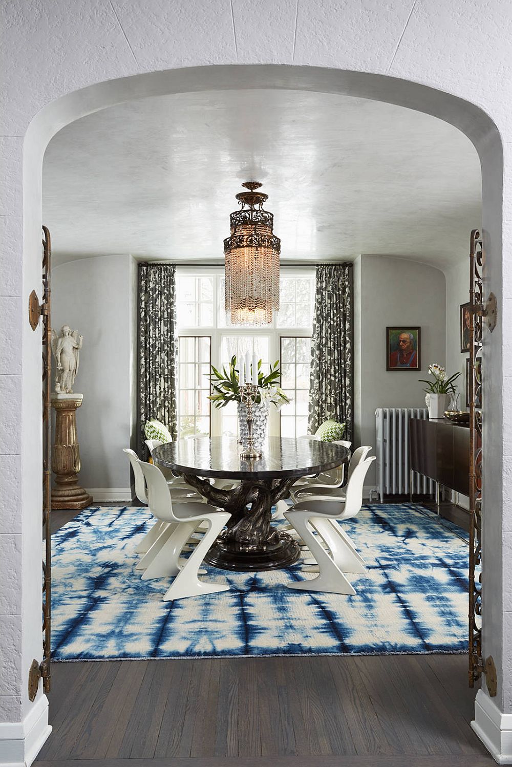 Add color and playfulness to your contemporary dining room in neutral hues with a dashing, colorful rug