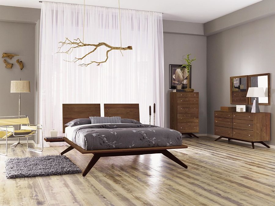 Awesome platform bed with splayed legs brings wow factor to this modern bedroom