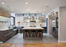 Beautiful-kitchen-with-wooden-cabinets-and-marble-backsplash-217x155