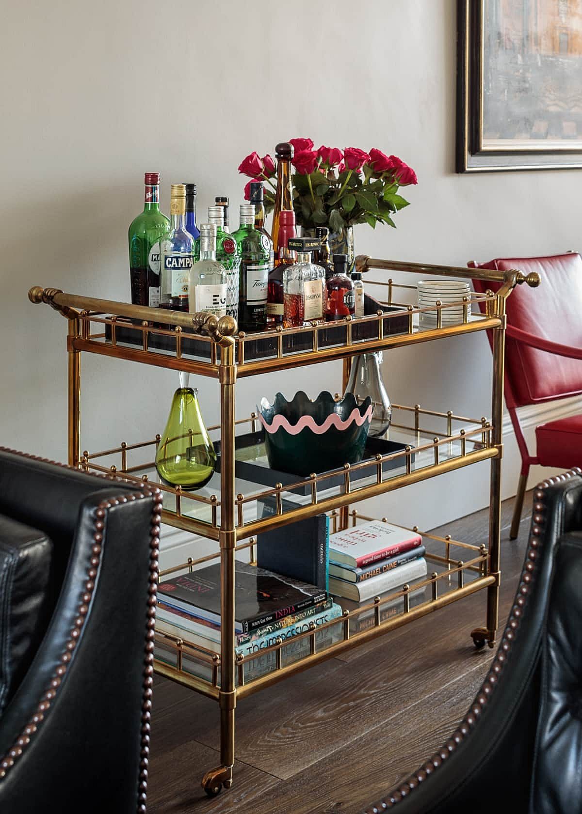 Beautiful use of bar cart with golden glint