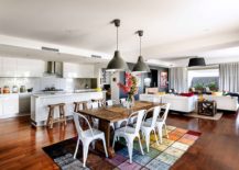 Bright-multi-colored-rug-and-oversized-pendant-lights-for-the-modern-dining-room-next-to-the-kitchen-217x155