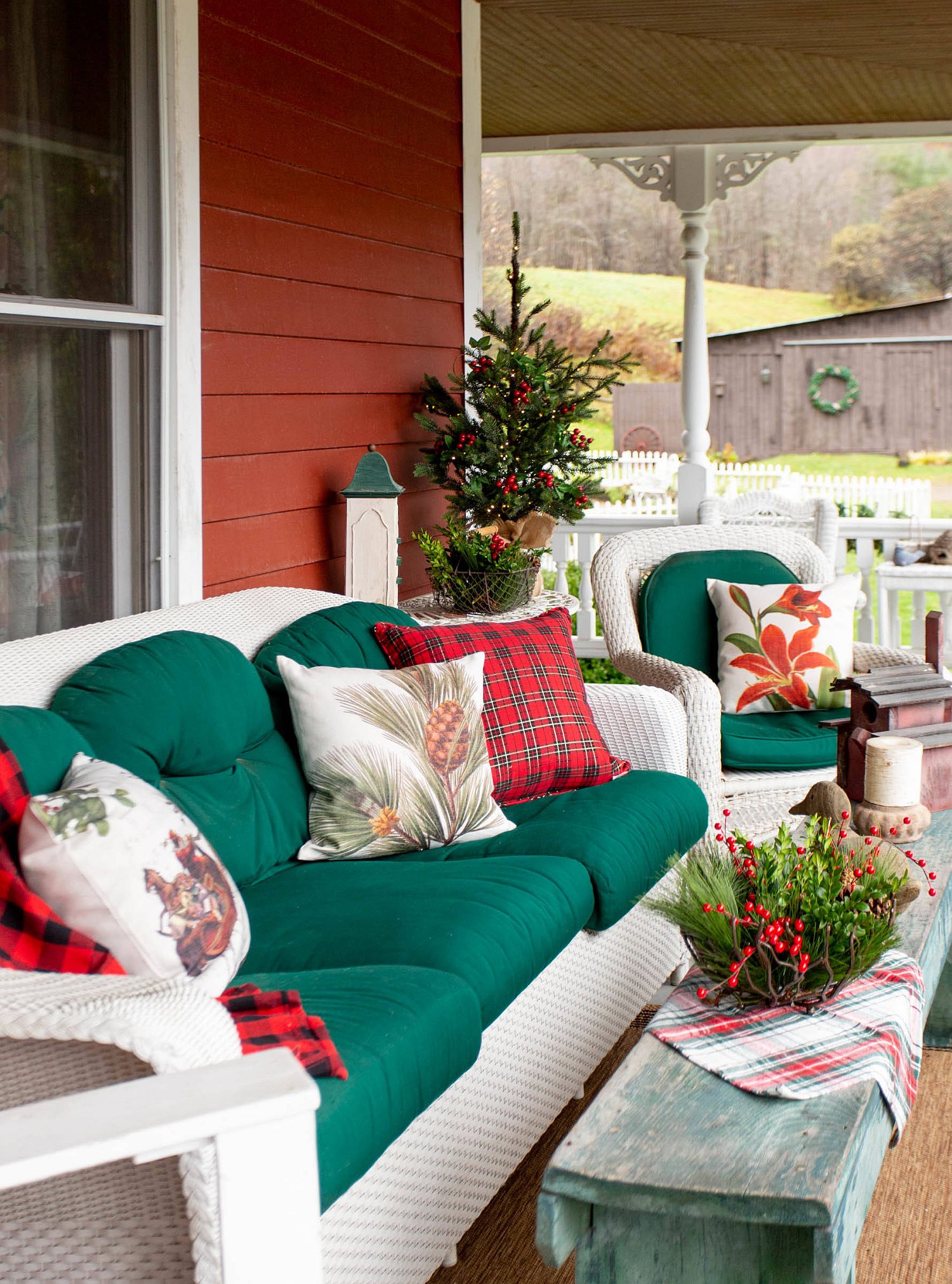 Change the colors of accent pillows and cushions of the outdoor couch to create a more festive porch