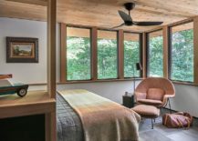 Comfortable-and-elegant-cabin-bedroom-with-stone-and-wood-shaping-it-217x155