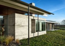 Concrete-and-glass-exterior-of-the-Wairau-Valley-House-217x155