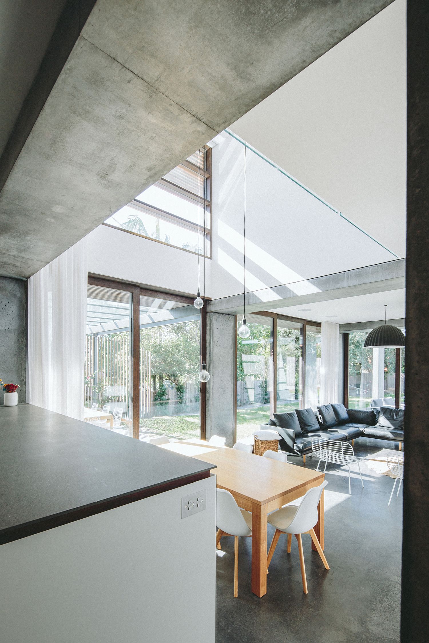 Concrete-slabs-wood-and-polished-interior-shape-the-house-with-sweeping-public-areas
